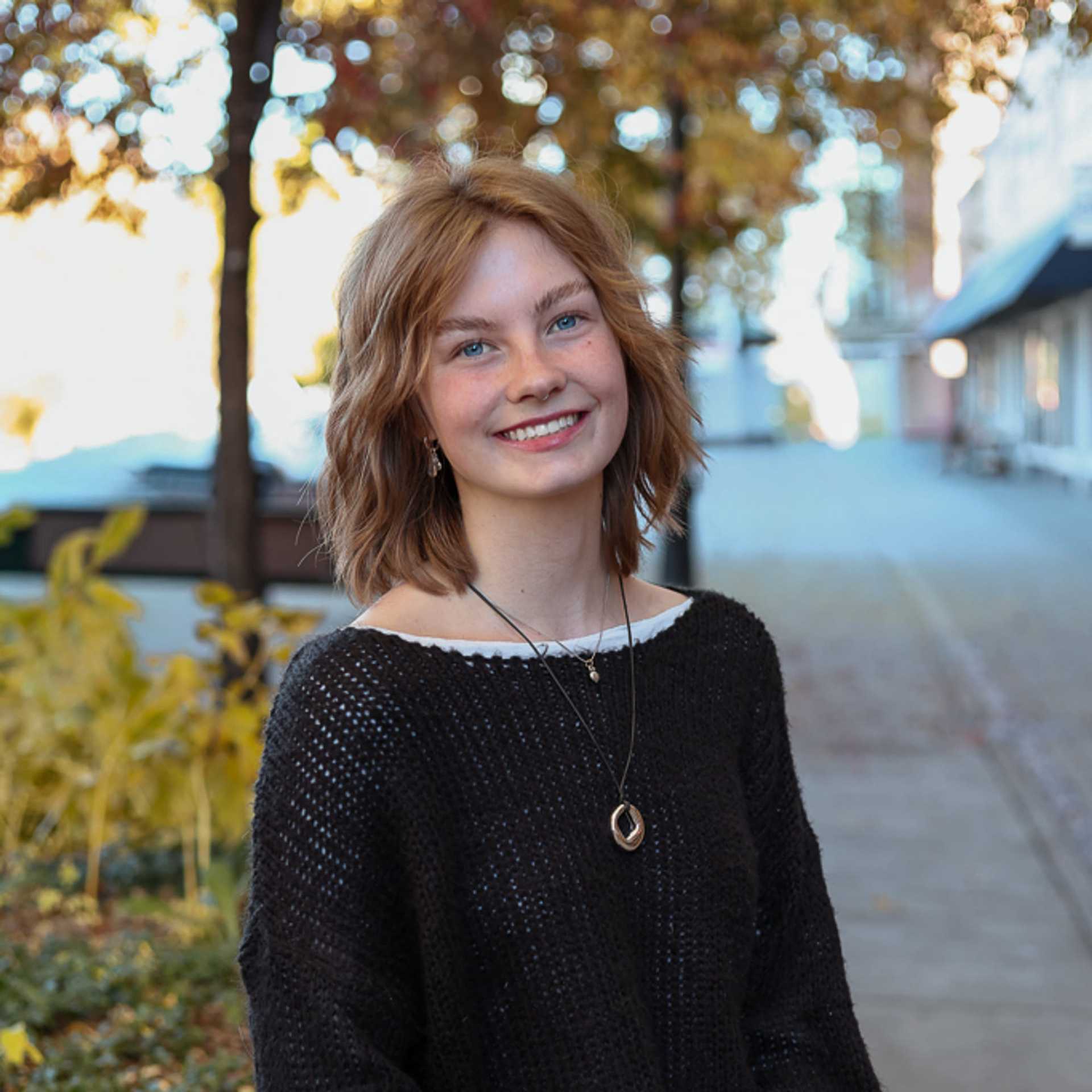 Portrait of Ryan, a professional stylist at Posh Salon And Boutique, showcasing their expertise and style.