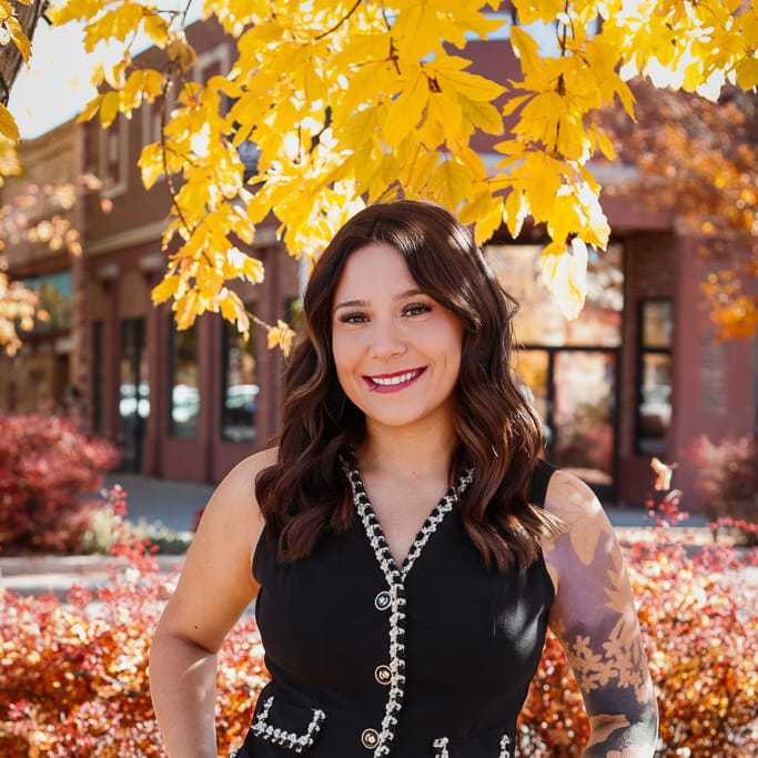 Portrait of Kayla, a professional stylist at Posh Salon And Boutique, showcasing their expertise and style.